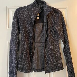Lululemon Zip Up Black, Size 4. Black and white dotted pattern. Gently Used.